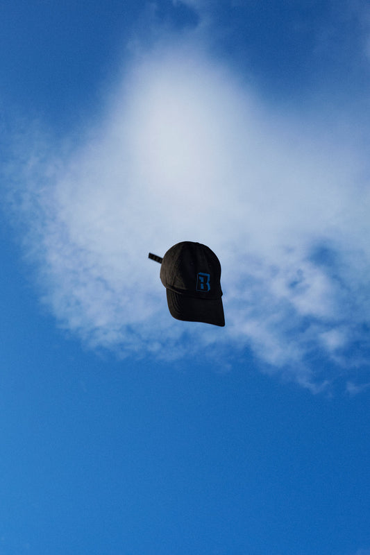 BY (B LOGO CAP)